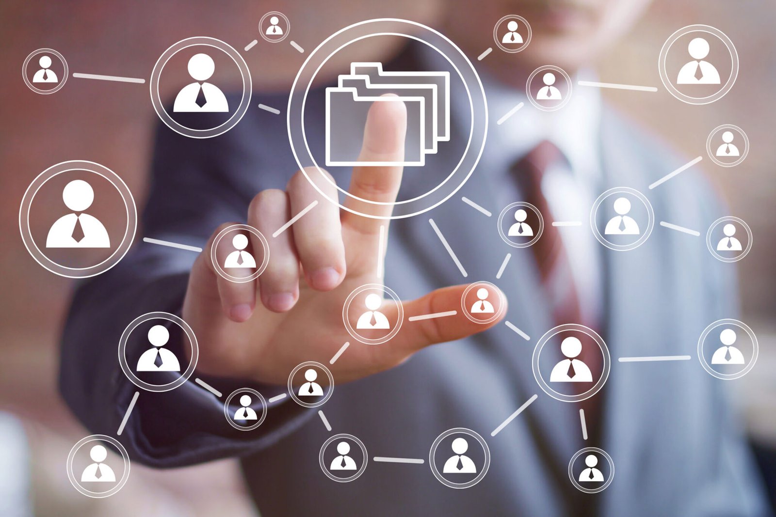 Person tapping on a folder icon connected to other business category icons