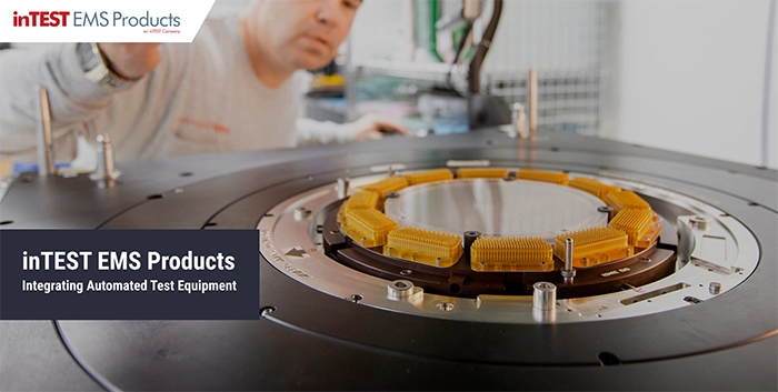 Man working with complex automated testing equipment